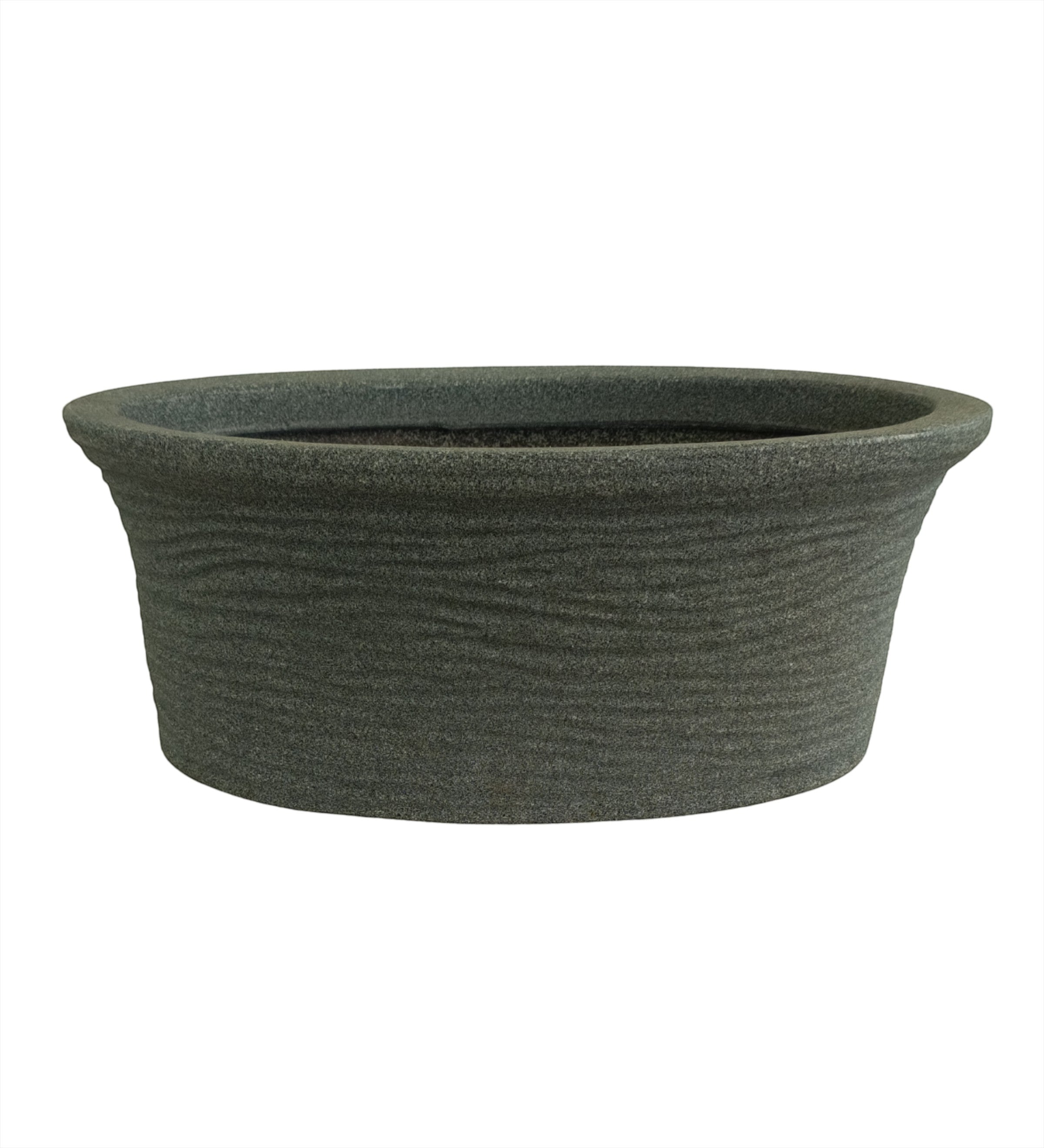 Nora Magnolia Pot in a dark grey roto molded planter pot  textured finish with a wide shallow profile for indoor or outdoor plant displays