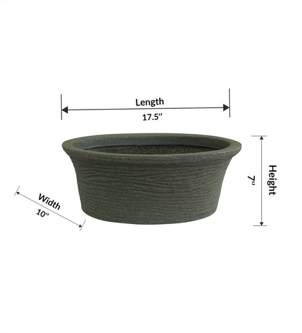 Nora Magnolia Pot, a wide shallow roto molded planter with a textured grey marble-like finish for indoor or outdoor gardening.