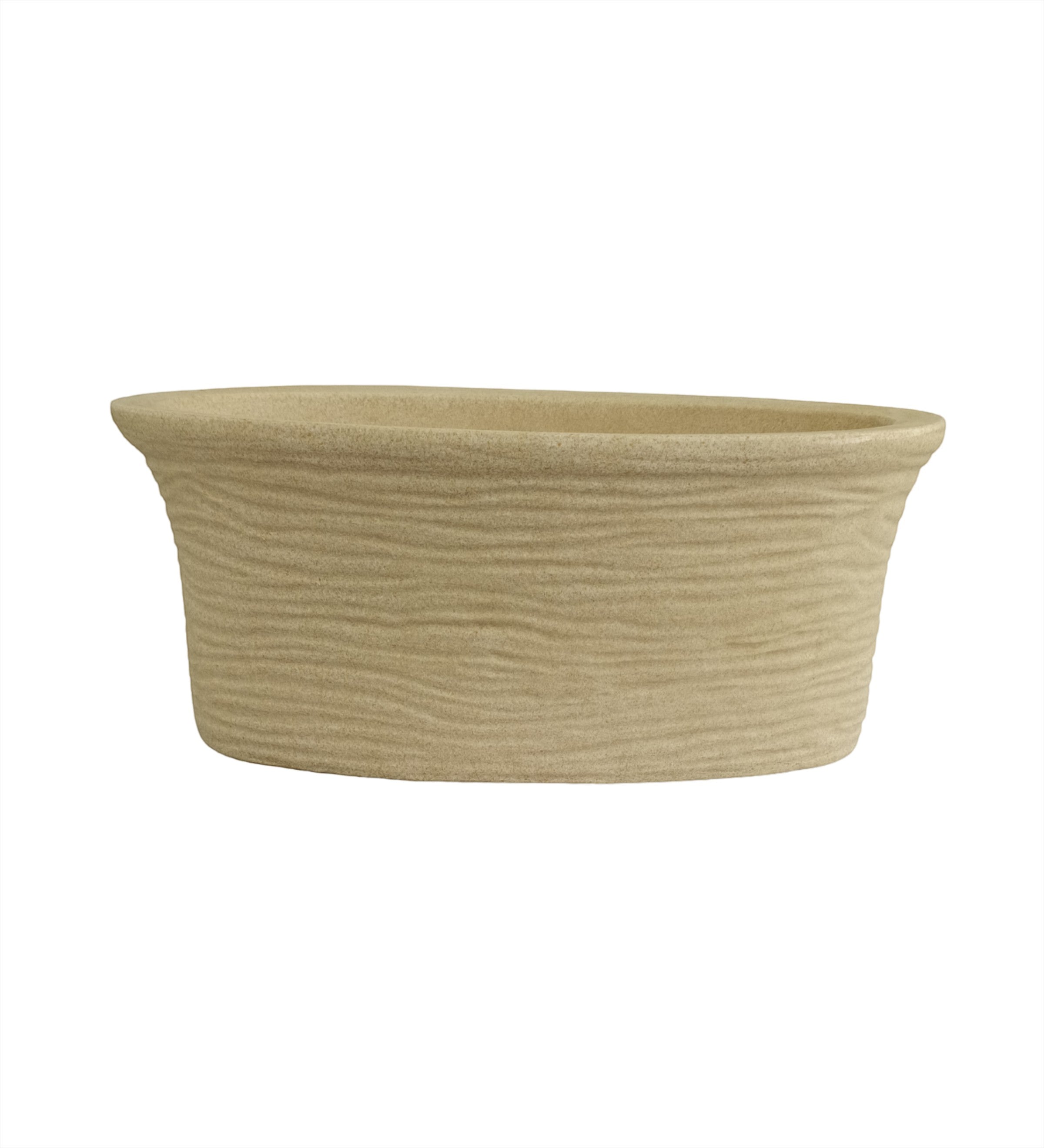 Nora Magnolia Pot with a textured beige stone-like finish roto molded planter pot  and a wide, shallow profile for indoor or outdoor plants.