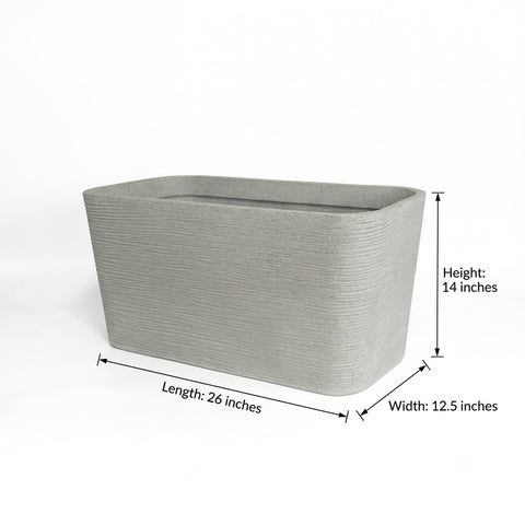 Nora 26-inch grey rectangular planter with a textured stone finish, ideal for modern outdoor garden decor.